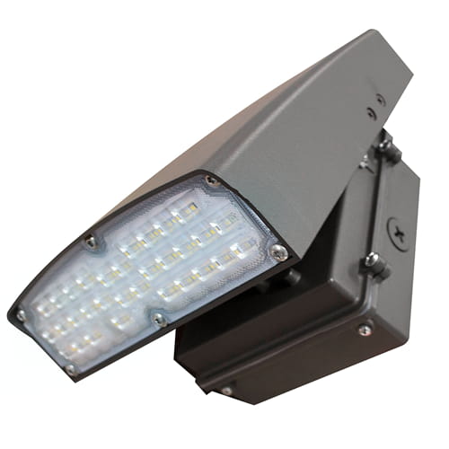 A compact adjustable wall pack is shown on an angle to the viewer with its array of LEDs visible behind the clear lens
